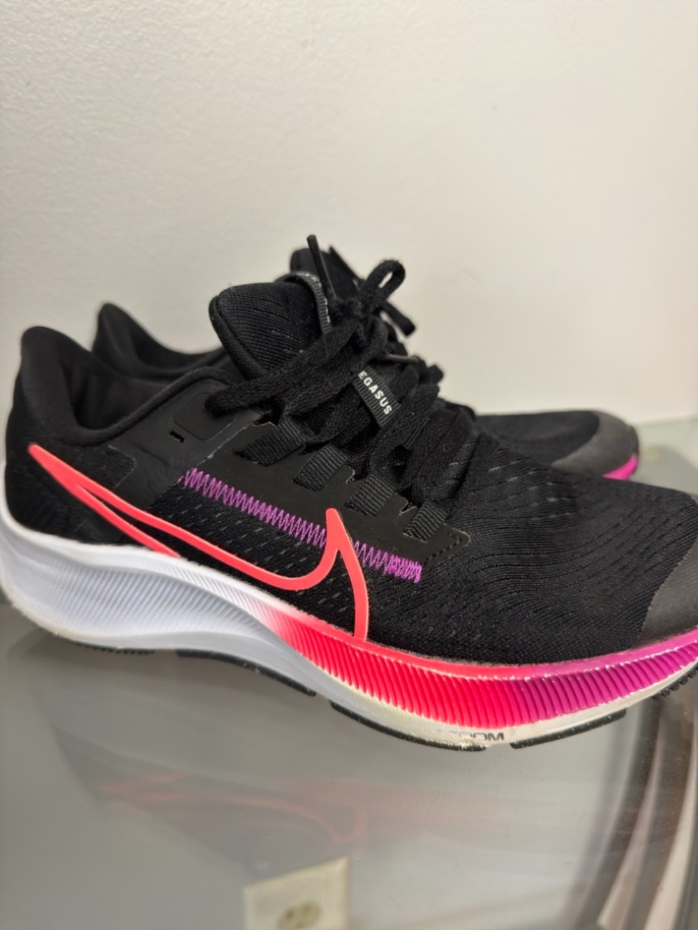 Nike Girl’s Black Running Sneakers with Pink and Purple Accents